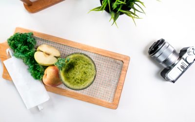 produce on cutting board, camera, and plant | juicing during pregnancy